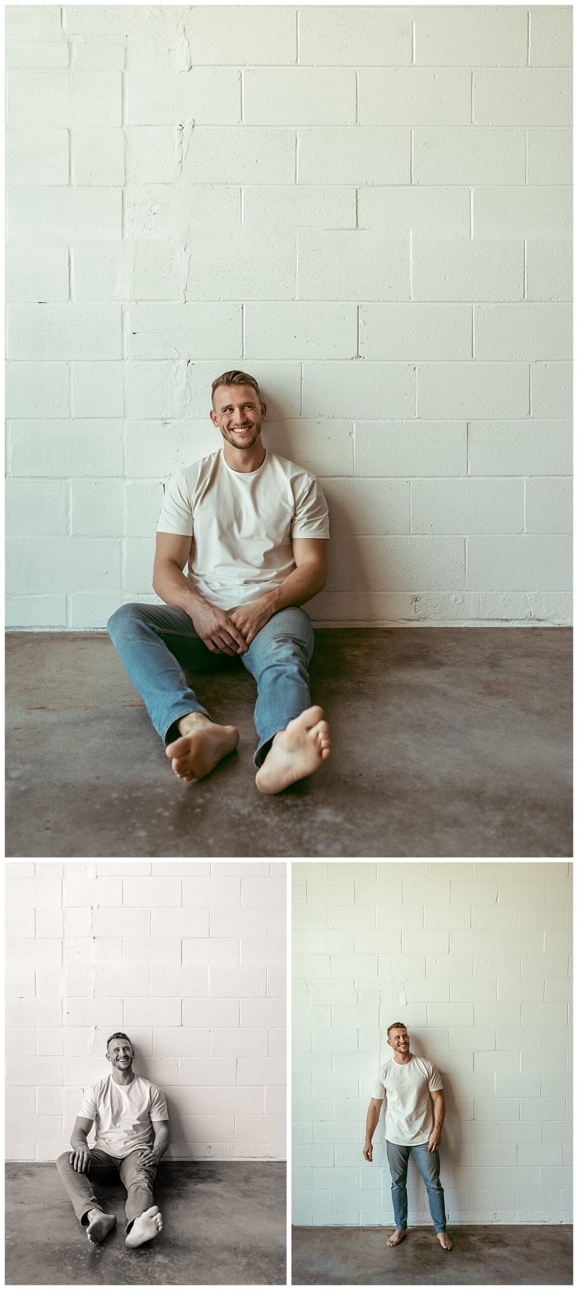 man smiles while leaning against brick wall in studio at couples session