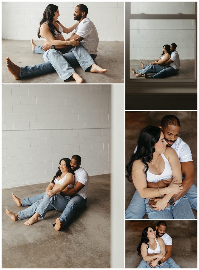parents-to-be sit together on the floor by Virginia Beach Photographer