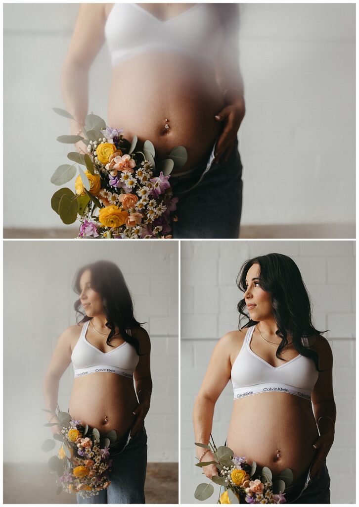 woman's growing belly highlighted with flowers by Virginia Beach Photographer