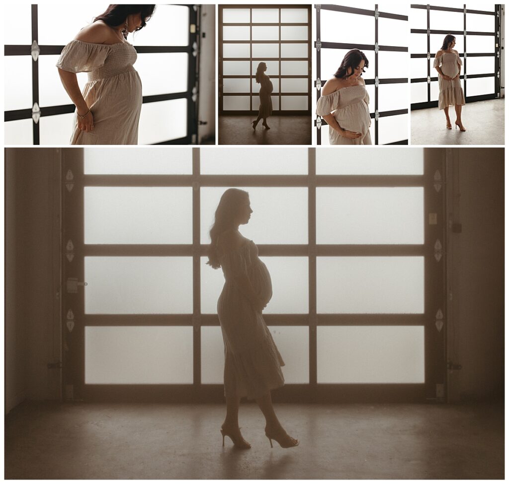 pregnant woman stands in front of brightly lit window during Studio Muse Maternity Session