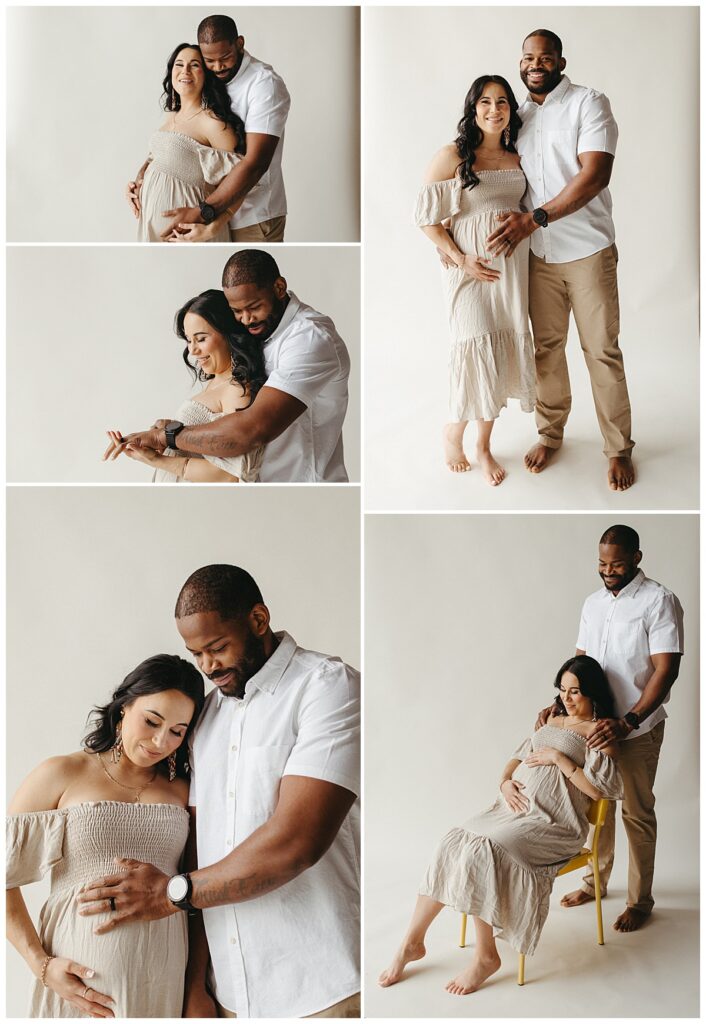 first time parents in neutral colors look at woman's pregnant belly by Virginia Beach Photographer