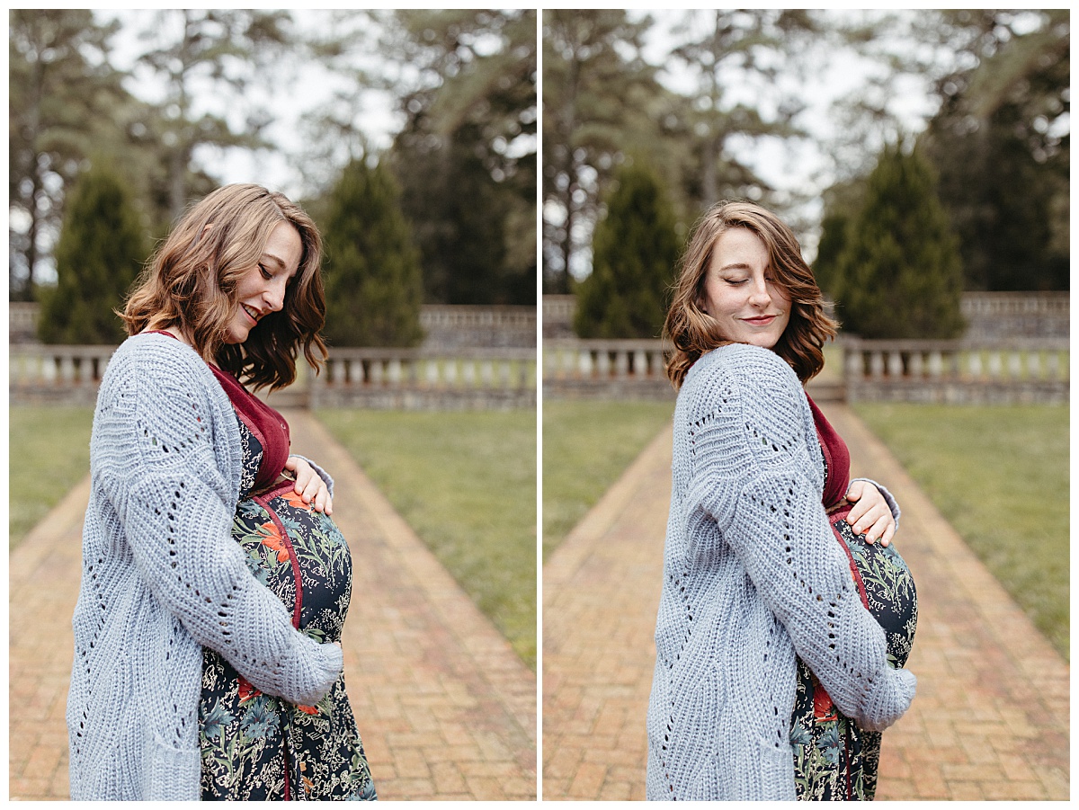 expectant mother holds her belly by Nikki Meer Photography