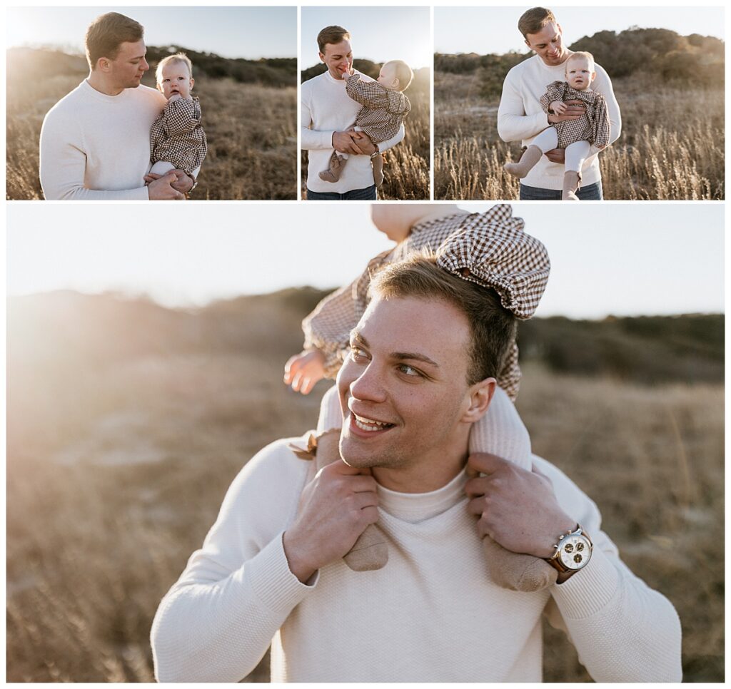 father holds baby girl on his shoulders by Virginia Beach photographer